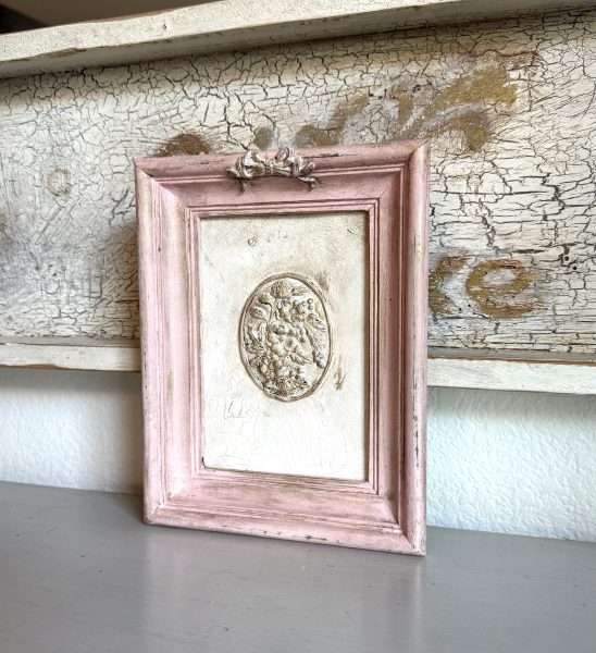 Vintage frame makeover in Petticoat Pink by Karen Berg of Redoux Interiors using DIY Paint and Iron Orchid Designs (IOD) mold — soft romantic upcycled wall décor project.
