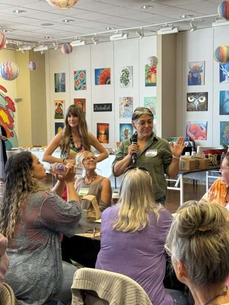 Sarah Norzad of Artisan Peacock in Brentwood speaking at the Girl on Fire Retreat hosted by Karen Berg of Redoux Interiors — sharing inspiration and creative community surrounded by DIY Paint and Iron Orchid Designs (IOD) Iron Orchid Designs creations